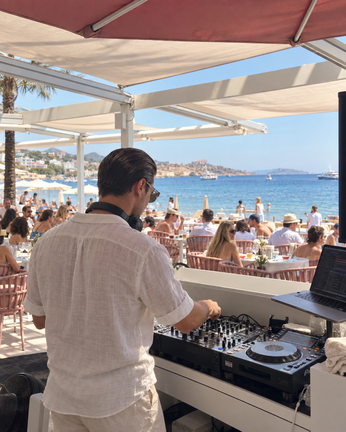 ROOM:SRVC DJ Sascha playing a set at Hotel Garbi Beach Club Ibiza with sea view and guests
